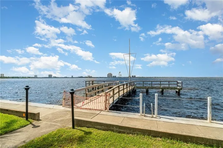 Fishing pier on Caloosahatchee River with view to Downtown Ft Myers