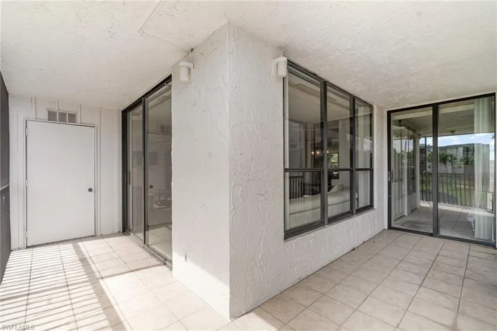 View to interior from balcony. Door on left is storage room.