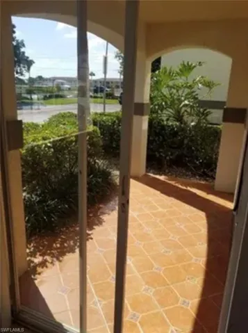 Entryway with tile patterned floors