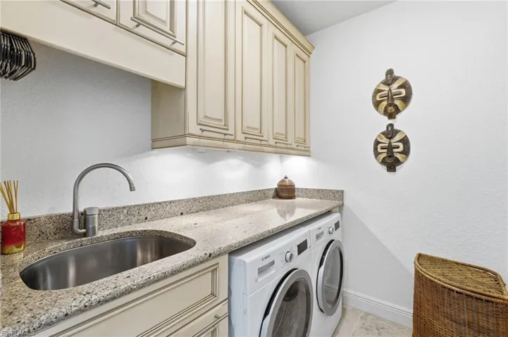 Granite countertop, underlighting, extra storage sink. hannging space.
