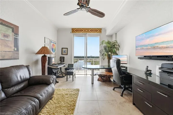 The third bedroom offers a private retreat with a sliding glass door providing access to a balcony where you can enjoy peaceful Florida sunrises and refreshing coastal breezes. This inviting guest suite is complete with its own full ensuite bath, offering comfort, privacy, and convenience for family or guests.