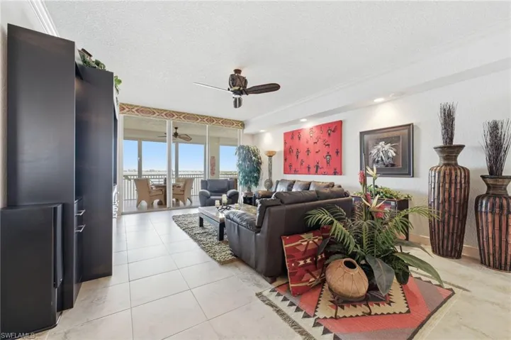 Enjoy breathtaking, unobstructed views every day, creating a spectacular backdrop from sunrise to sunset. Inside, elegant tile flooring flows seamlessly throughout the residence, complemented by refined crown molding and a spacious open-concept great room designed for both luxurious living and effortless entertaining.