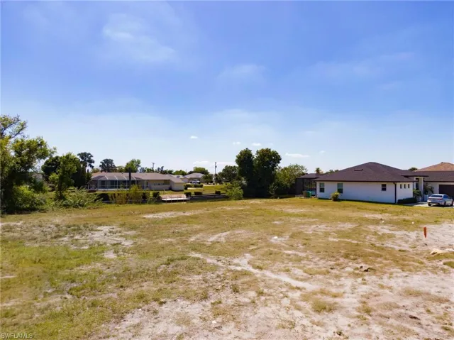 Ground level view from the NE front corner of lot.