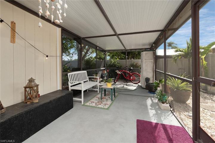 PEACEFUL, LARGE, SCREENED BACK LANAI OVERLOOKS YOUR FENCED BACK YARD.