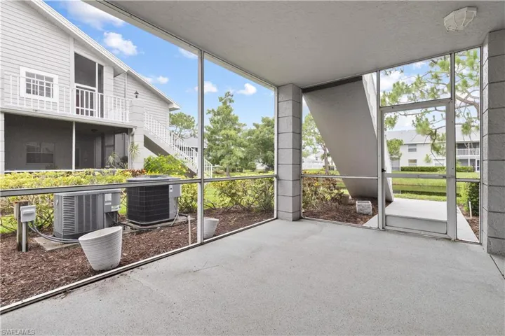 Very large screened patio with access to backyard lawn and lake