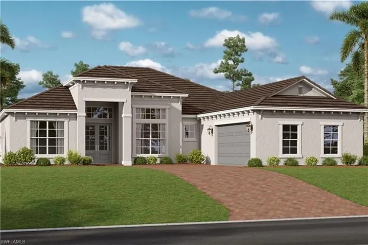 View of front facade with a garage and a front lawn
