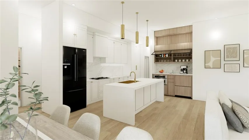 Kitchen with black refrigerator with ice dispenser, light wood-style flooring, white cabinets, open shelves, and pendant lighting