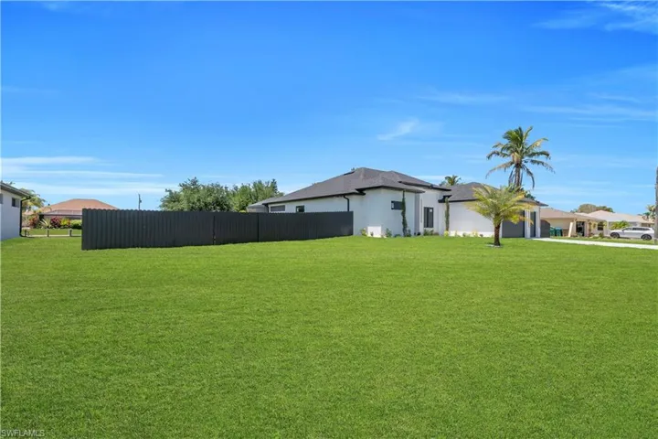 Expansive green lawn providing ample outdoor space