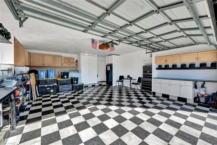 The garage is a 2 car garage & a dream for car enthusiasts!