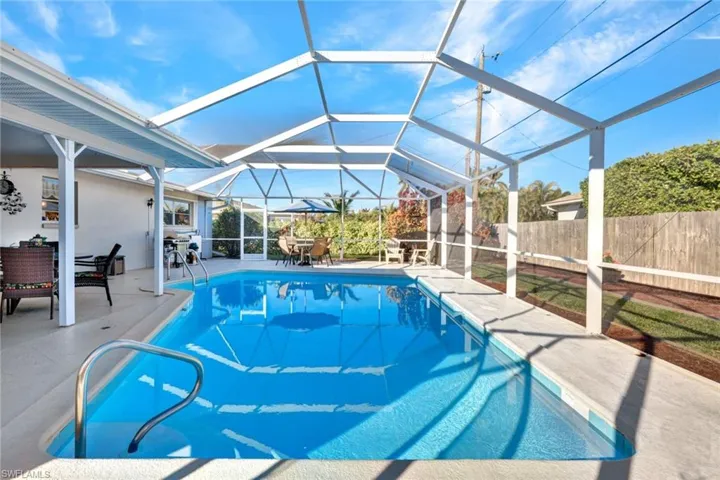 The pool deck is extremely private and fenced