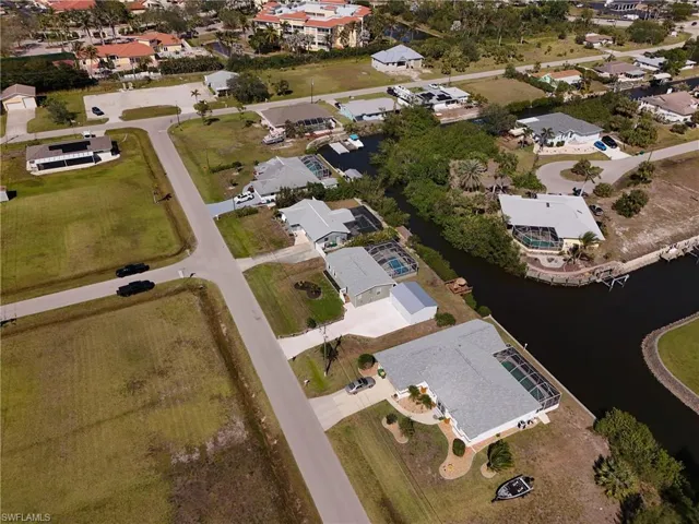 Bird's eye view with a residential view and a water view
