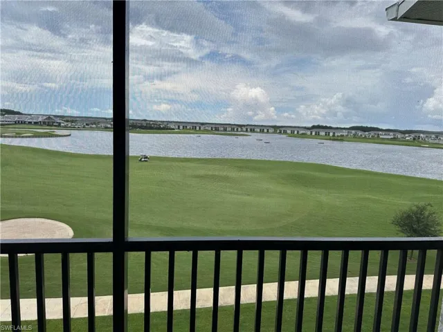 View of Golf course and lake