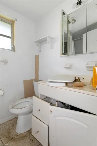Bathroom with toilet and vanity