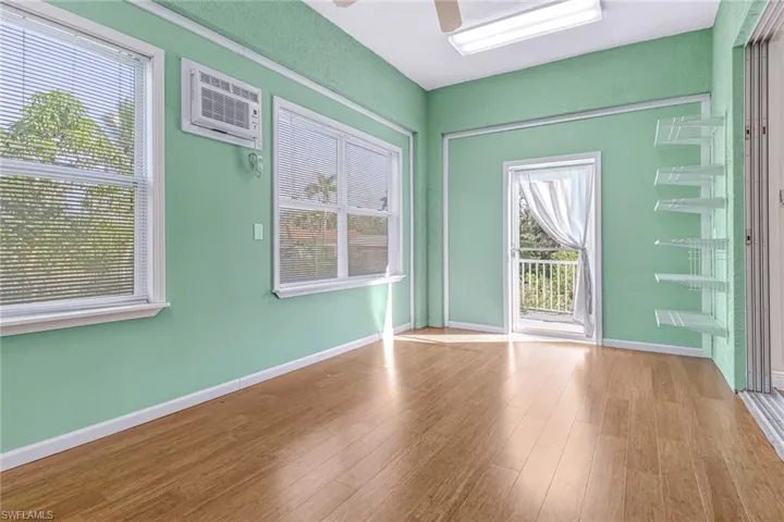 Enclosed porch. Was screened and could be re-converted