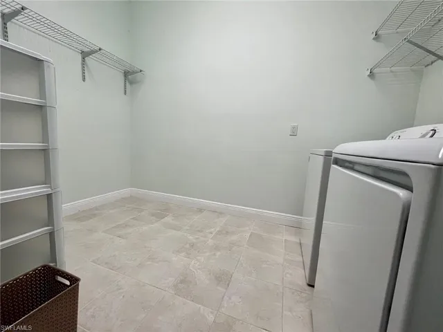 Laundry area with separate washer and dryer