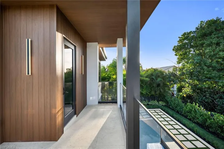 Private balcony off the upstairs primary suite.