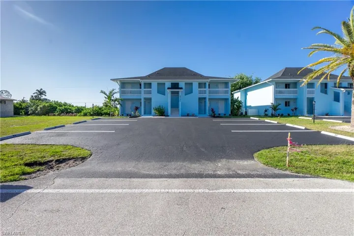 View of front of home featuring a balcony
