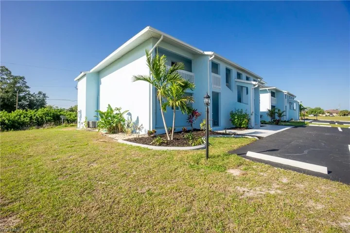 View of home's exterior featuring a lawn