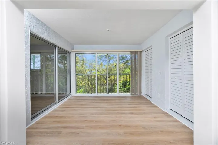 Unfurnished sunroom featuring a healthy amount of sunlight