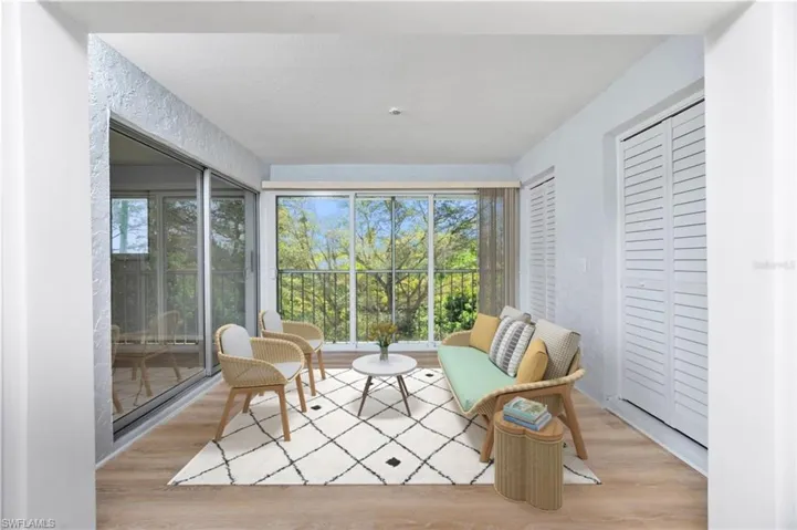 Sitting room featuring light hardwood / wood-style flooring