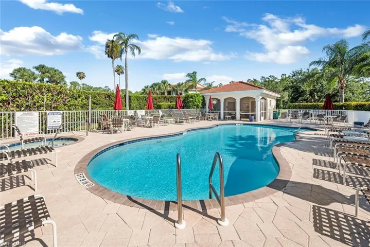 View of swimming pool with a patio area