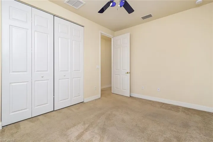 Bedroom # 5, features walk in closet and conveniently located close to the shower, almost another suite.