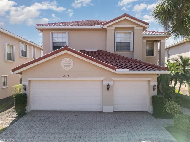 Mediterranean / spanish-style home featuring a 3 car garage.
