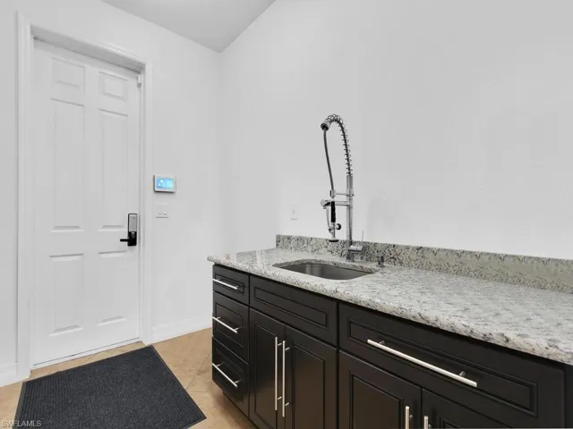 Bathroom with tile patterned flooring