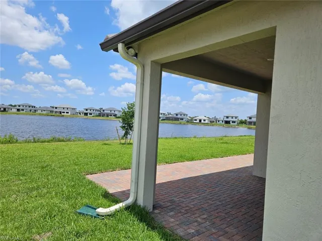 Water view featuring nearby suburban area