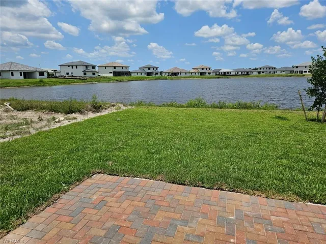 Water view featuring nearby suburban area
