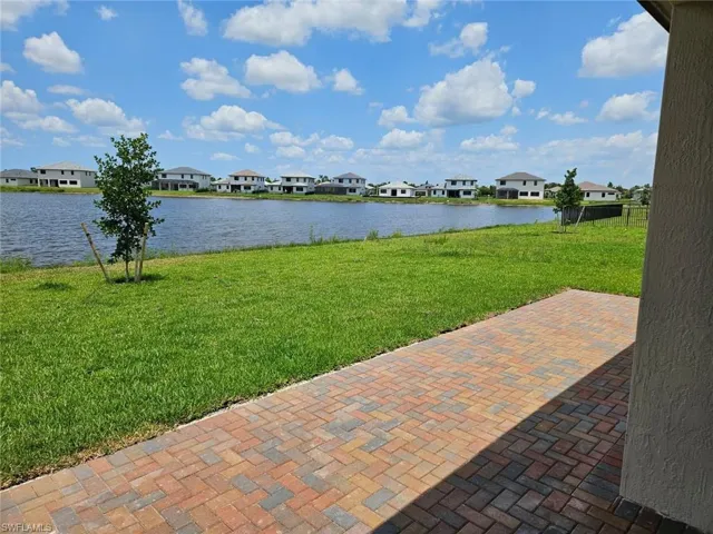 Water view featuring nearby suburban area