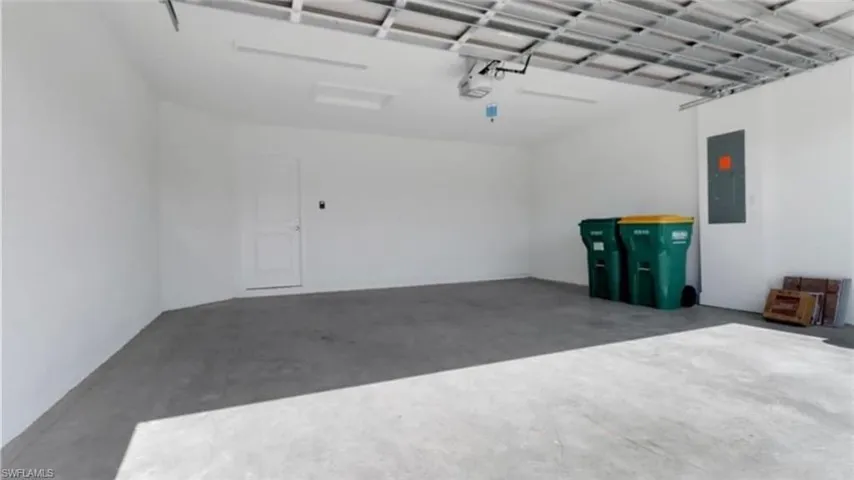 Garage featuring electric panel