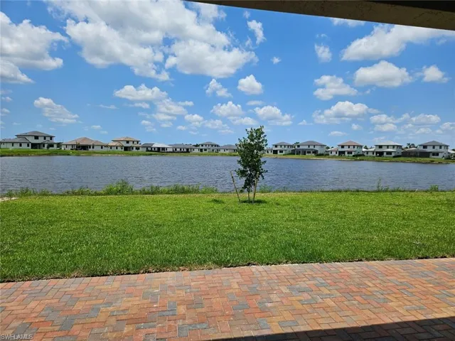 Water view featuring nearby suburban area