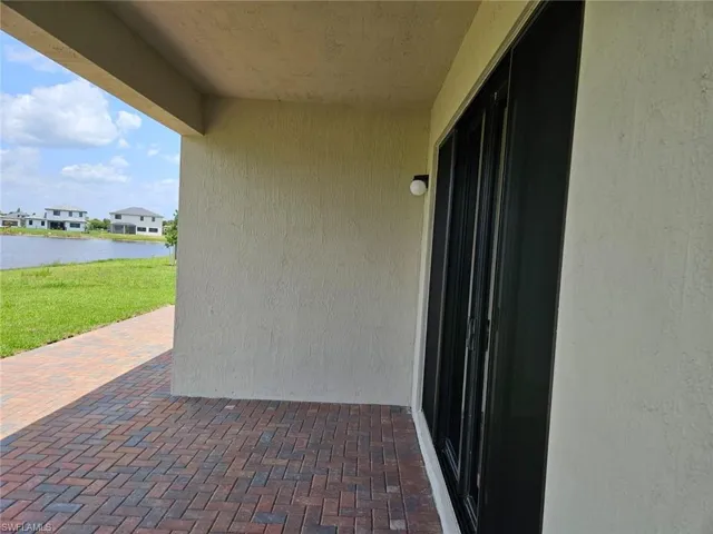View of patio / terrace featuring a water view