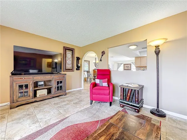 Living area with a textured ceiling