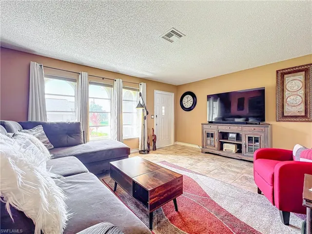 Living room with a textured ceiling