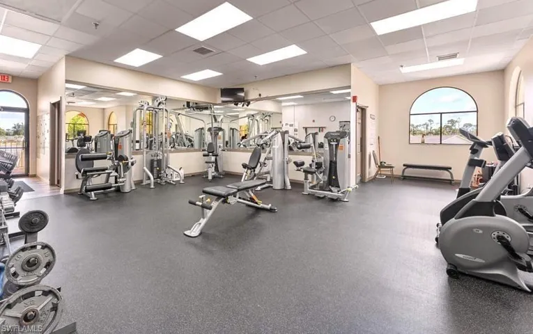 Exercise room with a paneled ceiling