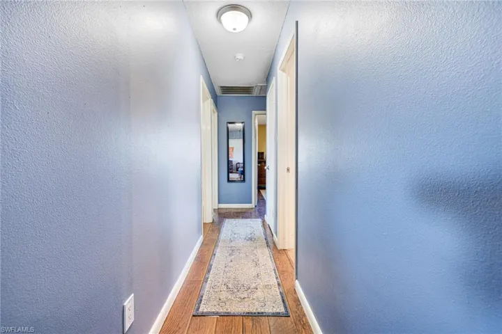 Hallway featuring light hardwood / wood-style flooring