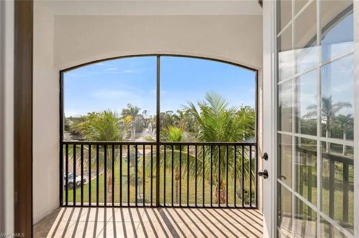 Unfurnished sunroom featuring plenty of natural light