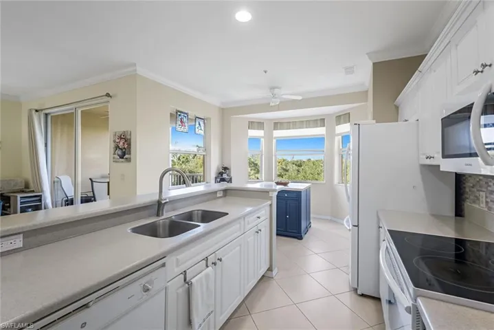 Bright & Open Kitchen with Custom Insulative Blinds
