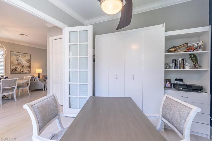 The den easily converts to a “third bedroom” with this built in Murphy bed!