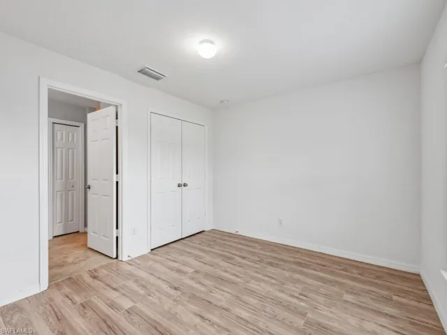 Guest bedroom with private entrance to guest bathroom.