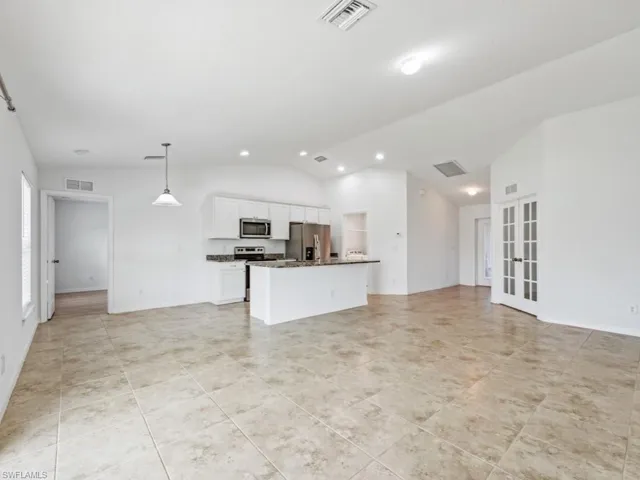 Open floorpan and cathedral ceilings make for a spacious feel.