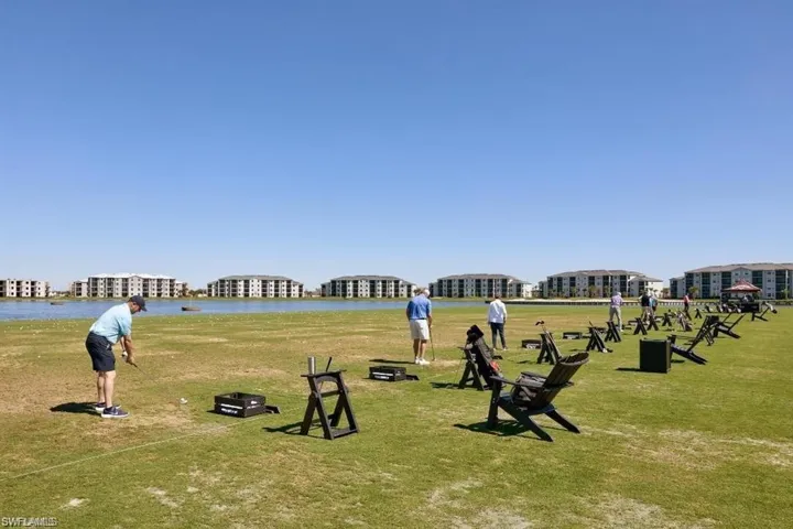 Golf course driving range with multiple hitting bays