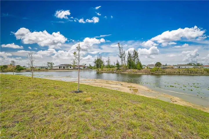 Water view featuring nearby suburban area