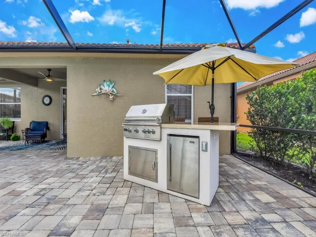 View of patio / terrace featuring a grill and exterior kitchen