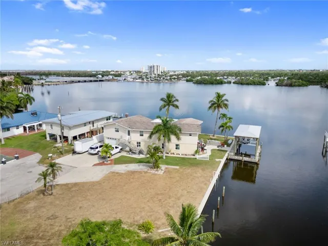 Water view featuring a boat dock and boat lift