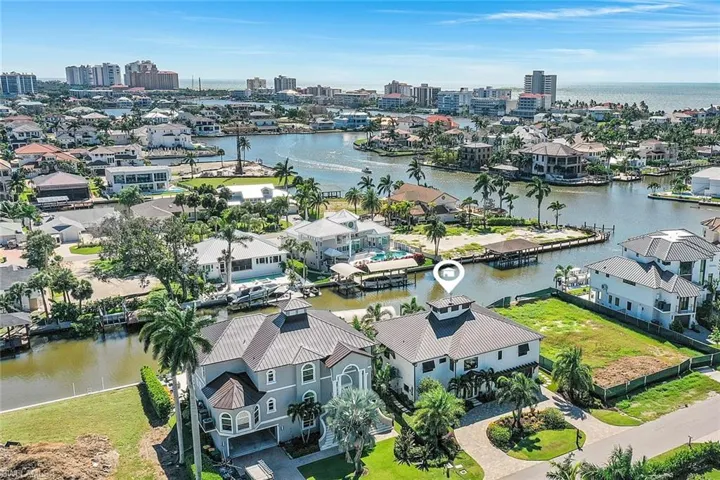 View of urban area with a large body of water and nearby suburban area
