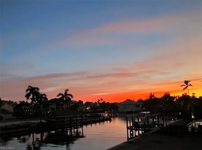 Water view with a dock