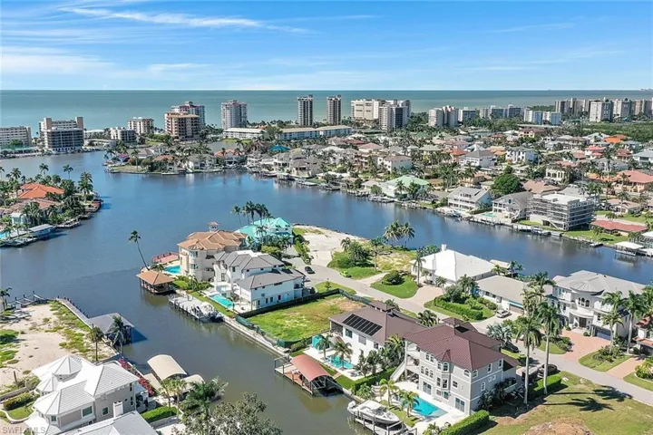 View of urban area with a large body of water and nearby suburban area